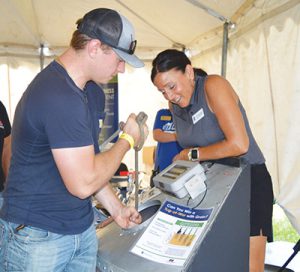 Grain bin safety demonstration at UMASH Wellness Pavilion at Minnesota Farmfest.